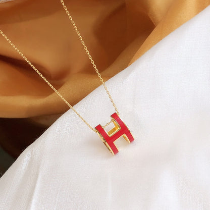 ˇGilded EraˇHM CLIC RED ENAMEL GOLD NECKLACE