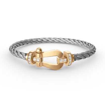 ˇGilded EraˇFORCE LARGE HORSESHOE HALF DIAMOND BRACELET GOLD