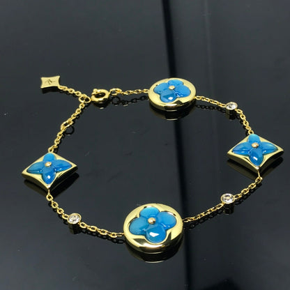 ˇGilded EraˇSTAR AND SUN 4 MOTIF BLUE BRACELET