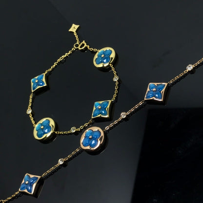 ˇGilded EraˇSTAR AND SUN 4 MOTIF BLUE BRACELET