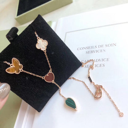 ˇGilded EraˇLUCKY SPRING 4 MOTIFS ROSE GOLD NECKLACE